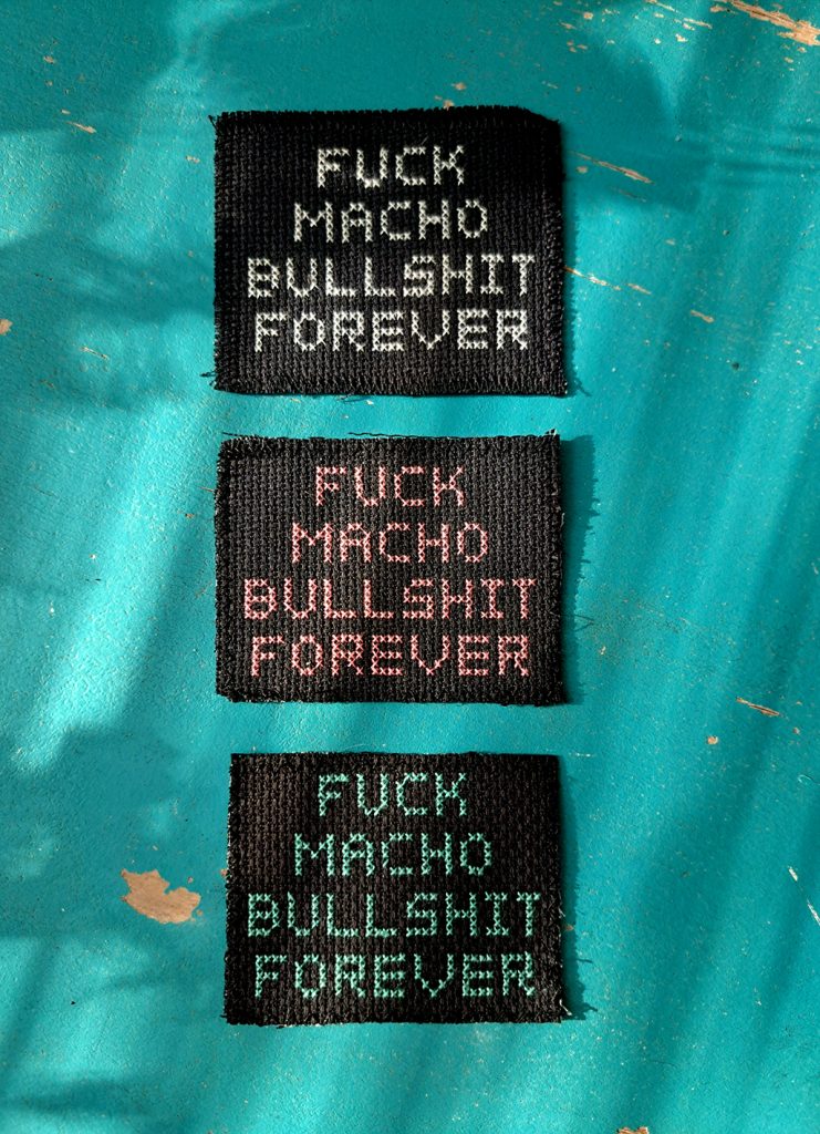 HANDMADE Fuck Macho Bullshit Forever kangasmerkki, eri värejä